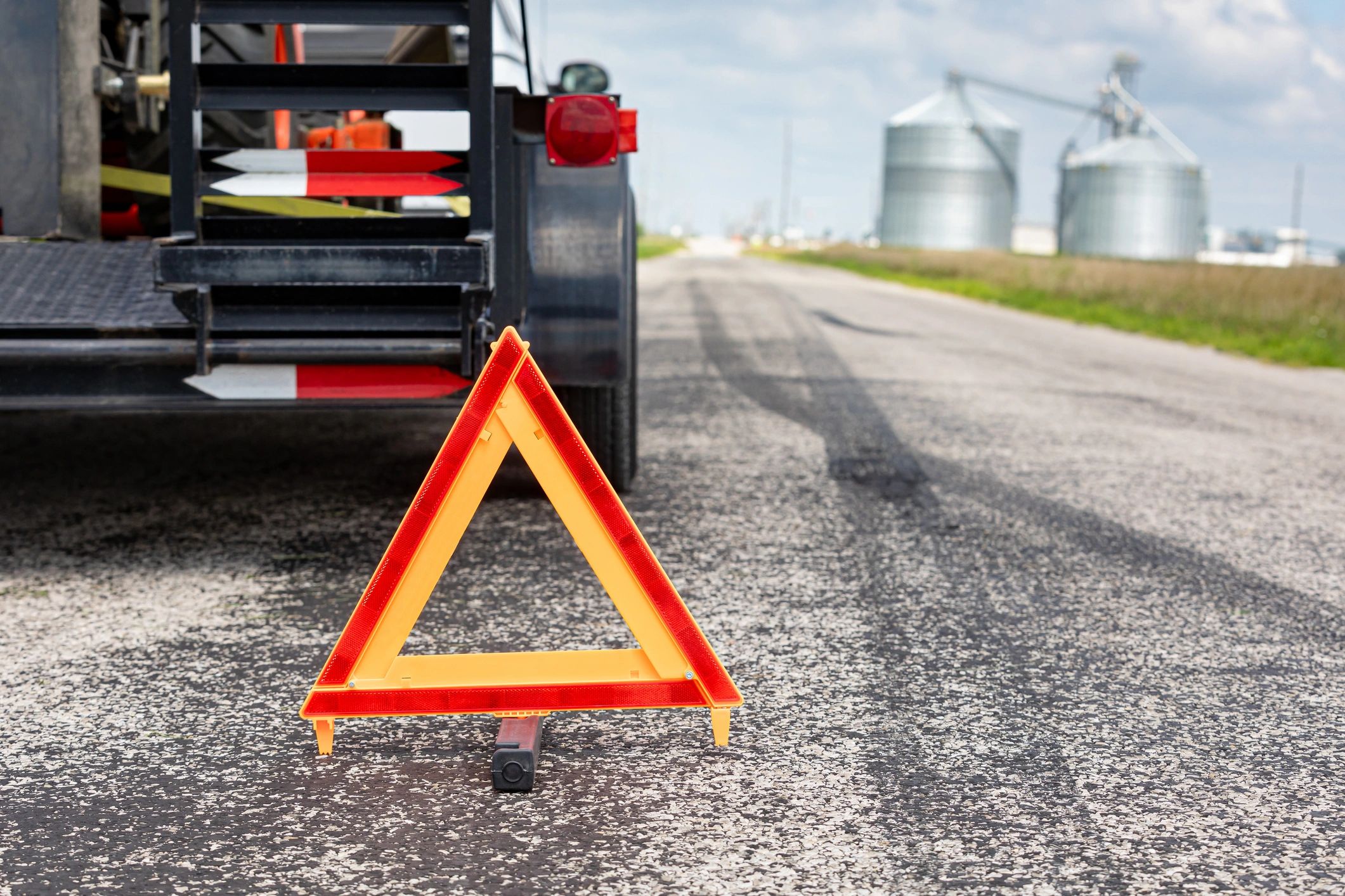 Technician providing emergency roadside truck repair service